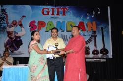 1st Topper (BscIT-4) Award to Preeti Kumari by Mr. Dineshanand Goswami with Mr. Om Prakash, Director GIIT